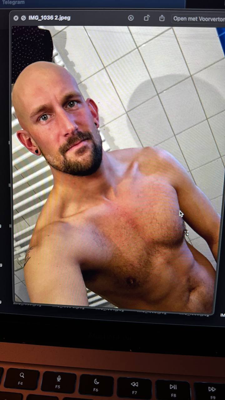 Muscular bald guy #nT7Q391G